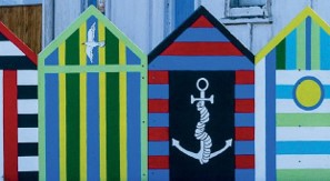 A colourful painted fence in a residential street in Kāpiti