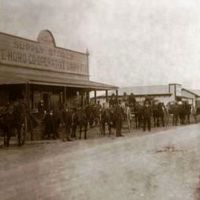 Te Horo Supply Stores. Farmers in town after a cream delivery, April 1915. Ōtaki Historical Society Inc Collection. thumbnail