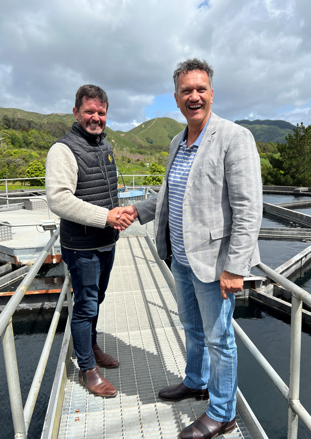 Blair Mould, Southern Region Manager Brian Perry Civil and Darren Edwards, Kāpiti Coast District Council Chief Executive shake hands after signing the new contract for a major upgrade at the Waikanae water treatment plant