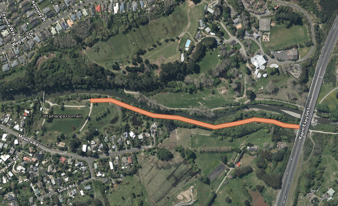 Aerial map of Ōtaihanga Domain showing an orange highlighted route following the Waikanae River between the domain and Kāpiti Expressway.
