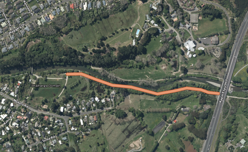 Aerial map of Ōtaihanga Domain showing an orange highlighted route following the Waikanae River between the domain and Kāpiti Expressway.