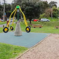 Tennis Court Road Playground octopus swings thumbnail