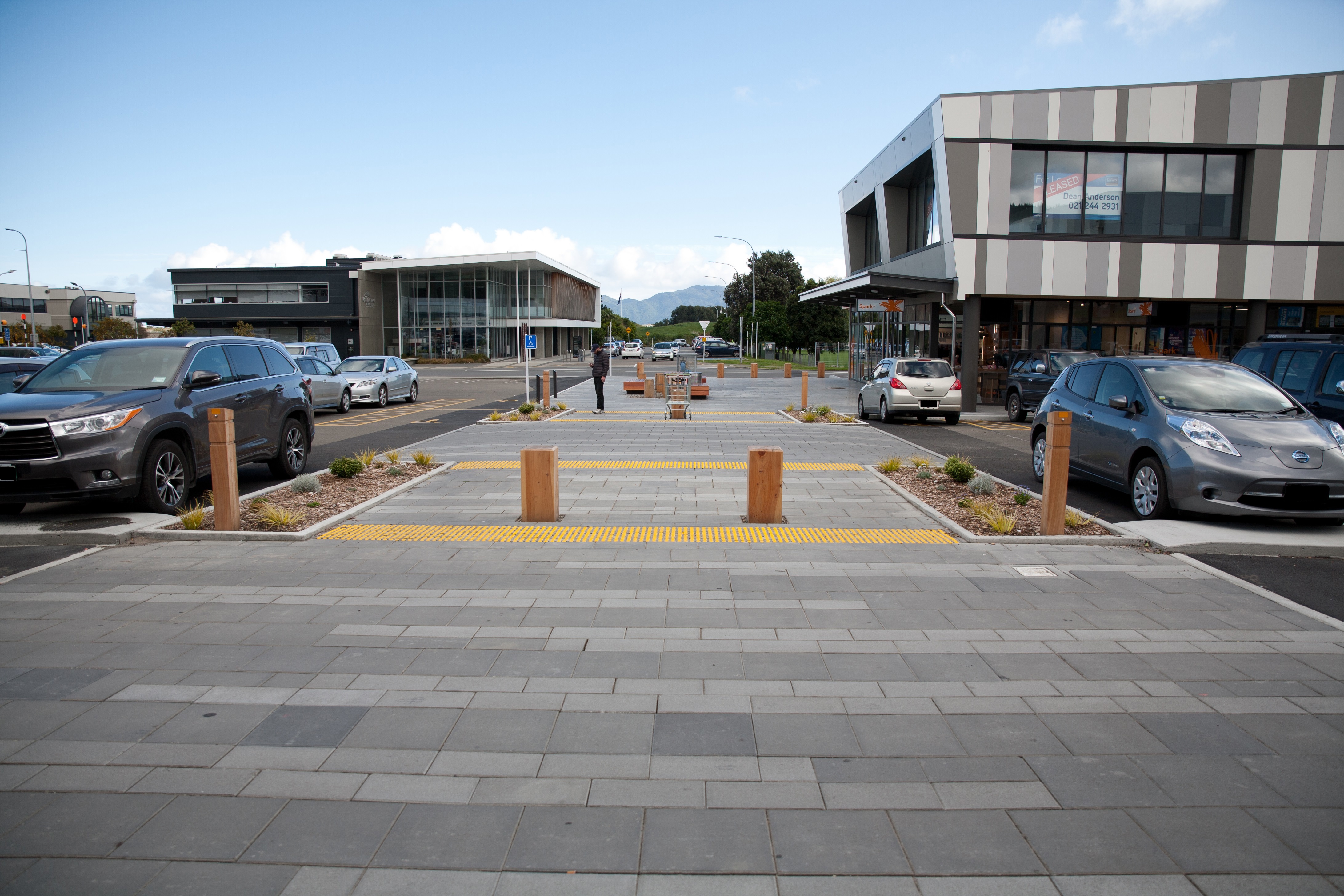 View of Coastlands carpark and Takiri House One and Rimu Road, looking towards Council buildings and Kāpiti Island