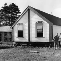 The Whakarongotai meeting house and the dining room under construction in 1979. Pictured are Ani Parata and Pehi Parata. Hp 172, Bruce MacMillan Collection, Kāpiti Coast District Libraries. (1) thumbnail