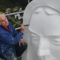 A close up of restoration work being carried out on the statue's face in 2012 thumbnail