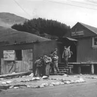 The post exchange is the woolshed built when Arthur MacKay sold the Ramaroa farm to the Gooding Family in 1936. Pictured are some of the US Marines stationed nearby during World War II. thumbnail