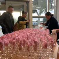 Attendees are poured drinks on arrival at Te Raukura ki Kāpiti thumbnail