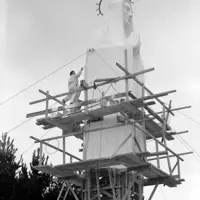 A plasterer at work on the scaffolding during construction in 1959 thumbnail