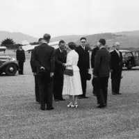 Royal Tour 1953/54 Queen Elizabeth II is greeted by local dignitaries at Paraparaumu Aerodrome. thumbnail