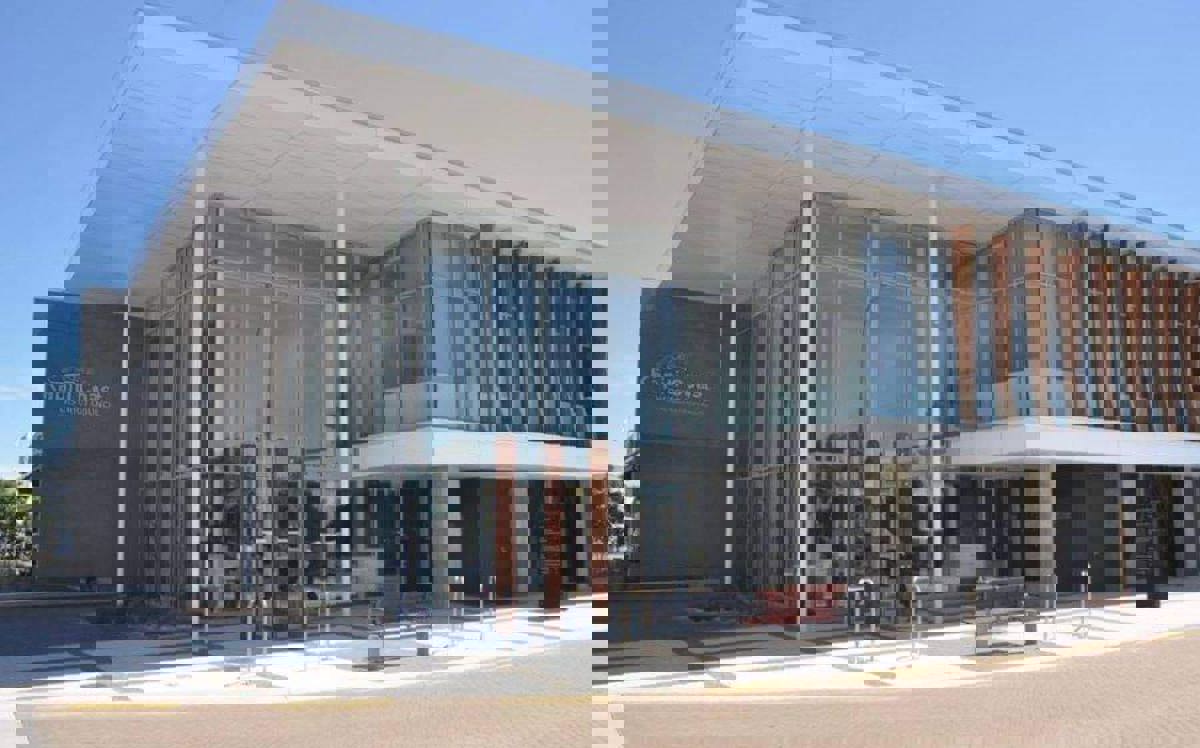 Photo of the Council Civic Building on the corner of Rimu Road and Iver Trask Place, in daylight, from across Iver Trask Place.