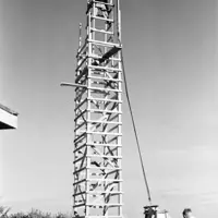 Another angle of the wooden scaffolding tower during the construction Our Lady Lourdes in 1958 thumbnail