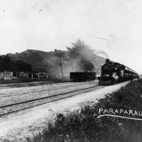 Driving the last spike of the Wellington and Manawatū Railway Company's line at the opening ceremony at Otaihanga on 3 November 1886. NZRE 752, NZ Railways Collection, Kāpiti Coast District Libraries. thumbnail
