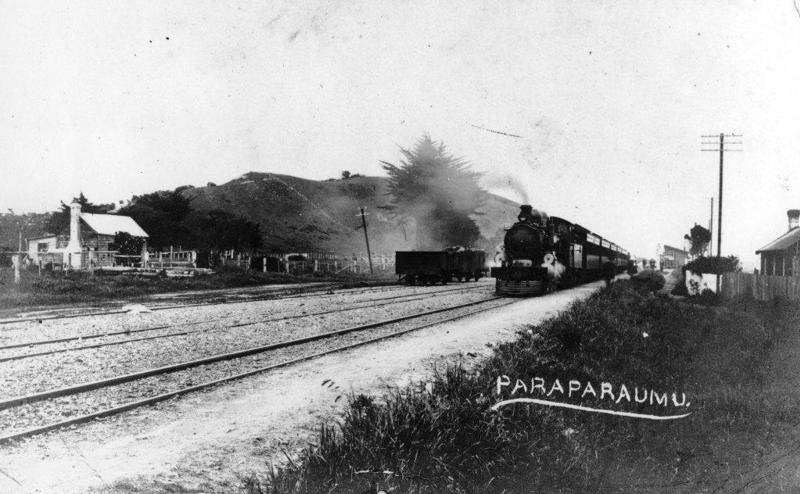 Driving the last spike of the Wellington and Manawatū Railway Company's line at the opening ceremony at Otaihanga on 3 November 1886. NZRE 752, NZ Railways Collection, Kāpiti Coast District Libraries.