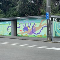 Ki Tātahi ki Paekākāriki | At Paekākāriki Beach – Entrance to public wharepaku from road thumbnail