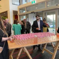 Welcome drinks in the foyer of Te Raukura ki Kāpiti thumbnail