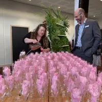 Staff at Te Raukura ki Kāpiti pour a drink for Deputy Mayor Lawrence Kirby thumbnail