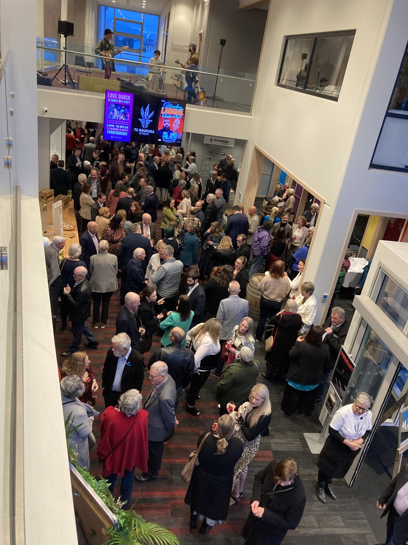 Crowd photo, with the Phil Simmons Band playing in the upper atrium.