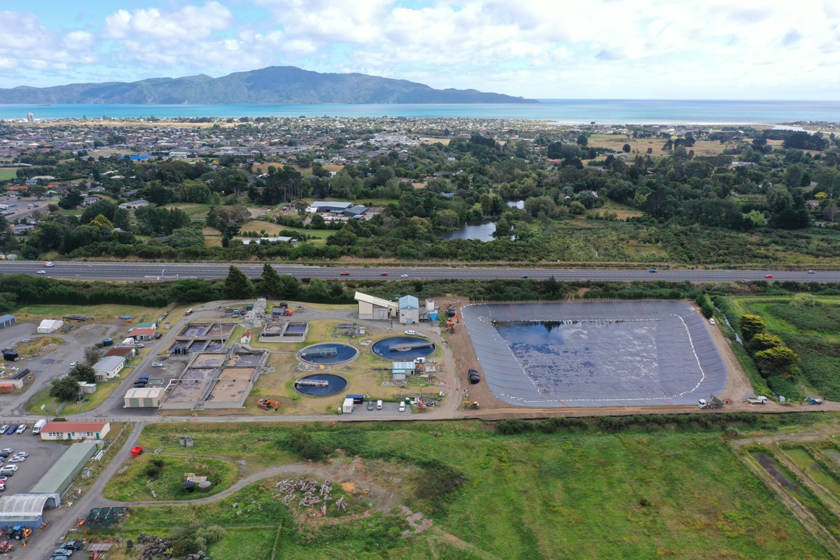 Aerial view of the Paraparaumu wastewater treatment plant with Kāpiti Island in the background. 