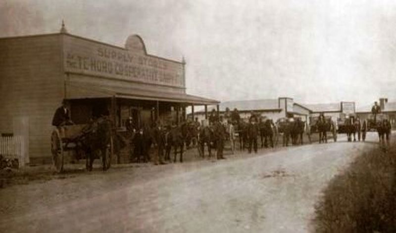 Te Horo Supply Stores. Farmers in town after a cream delivery, April 1915. Ōtaki Historical Society Inc Collection.
