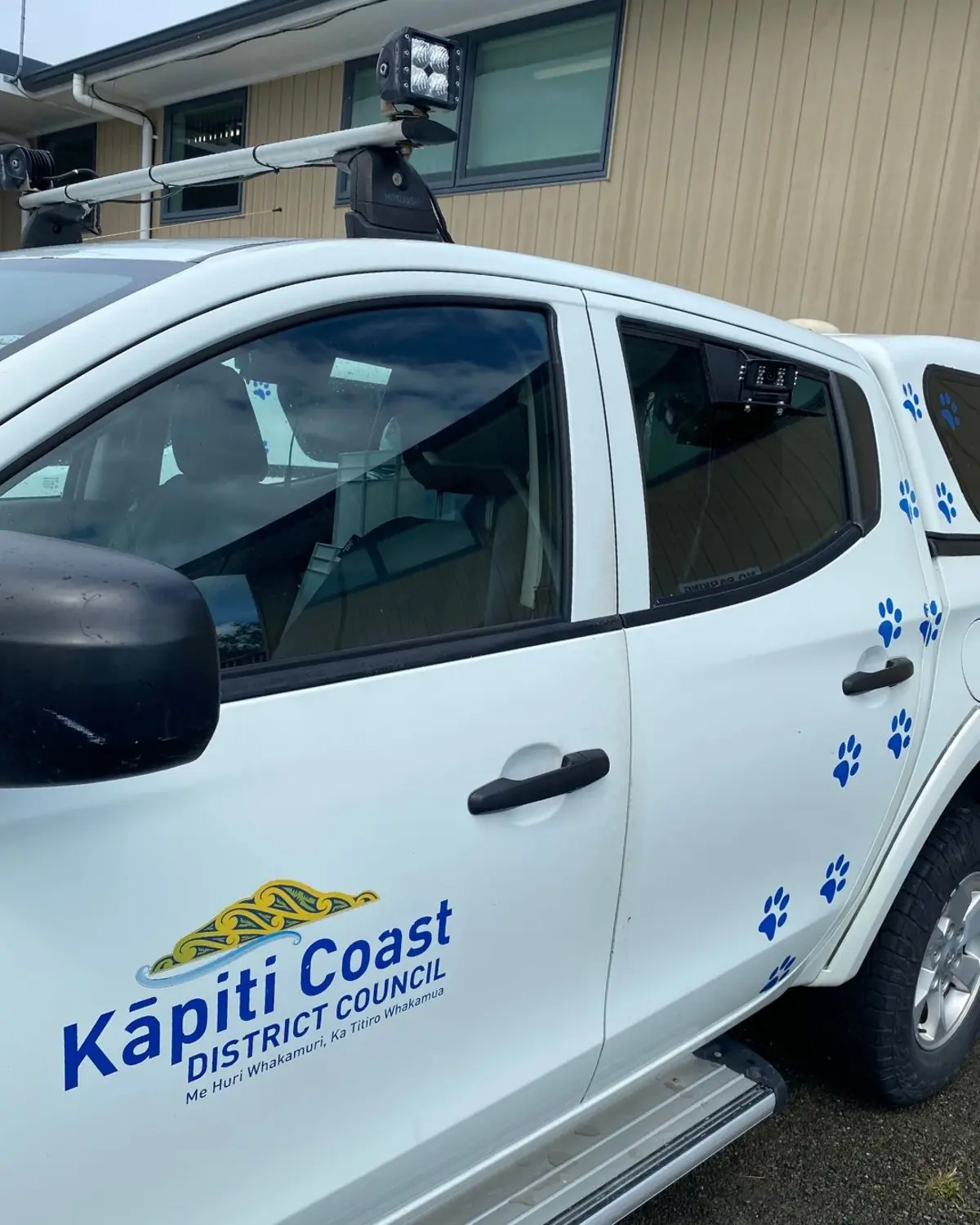 A white coloured Council ute showcasing a camera mounted to its roof on a bracket 
