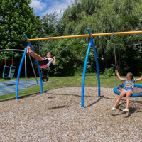 Sunny day on the swings at Haruātai Park thumbnail
