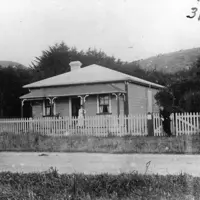 The Paraparaumu School schoolmaster Mr Vaughan and his wife on their verandah at 30 Hinemoa Street in 1908. The building became Paraparaumu Playcentre thumbnail
