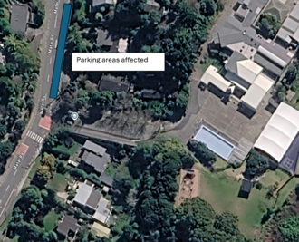 A satellite view of a suburban area showing houses, trees, and a nearby complex with large buildings and open grounds. A road runs along the left side, where a long blue-highlighted section marks affected parking areas. A label reading “Parking areas affected” points to a shaded area near a cluster of trees and buildings in the center of the image.