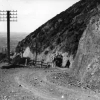 A heavily laden Ford model T truck making the ascent up Paekākāriki Hill Road, and the view norwards in 1924. SC Smith Collection, Alexander Turnbull Library. Ref: 47388 1/2 thumbnail