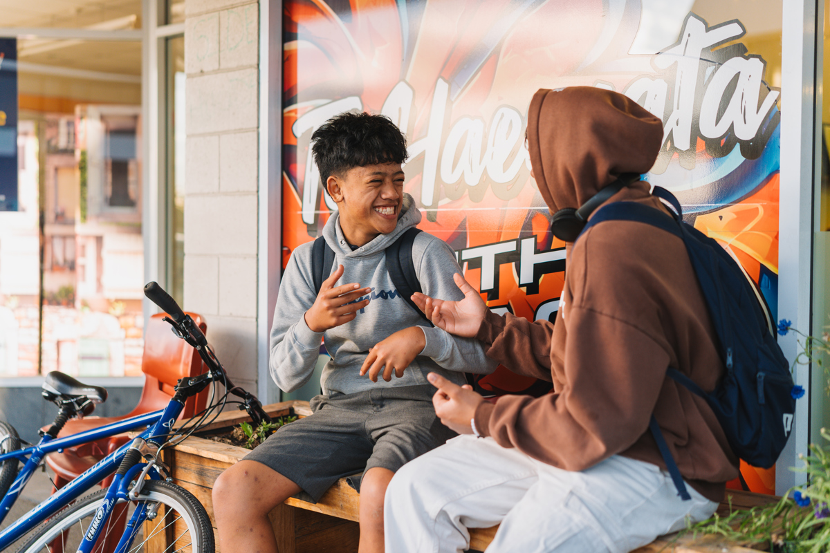 Two youth laughing together