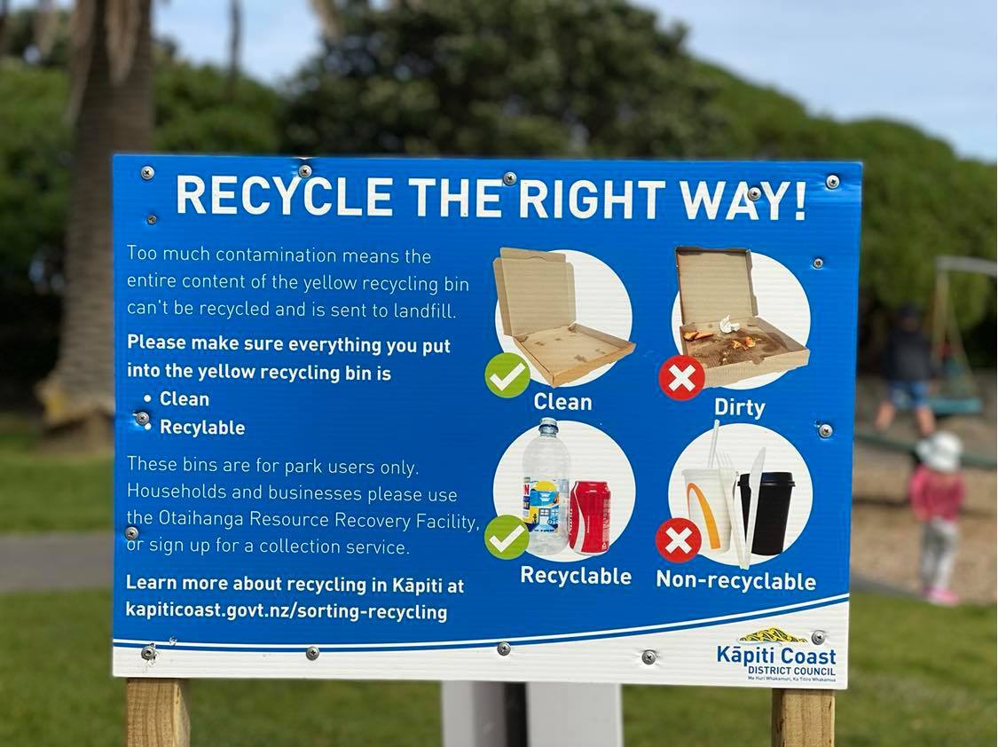 Photo of the "Recycle the right way" sign at the recycling trial.