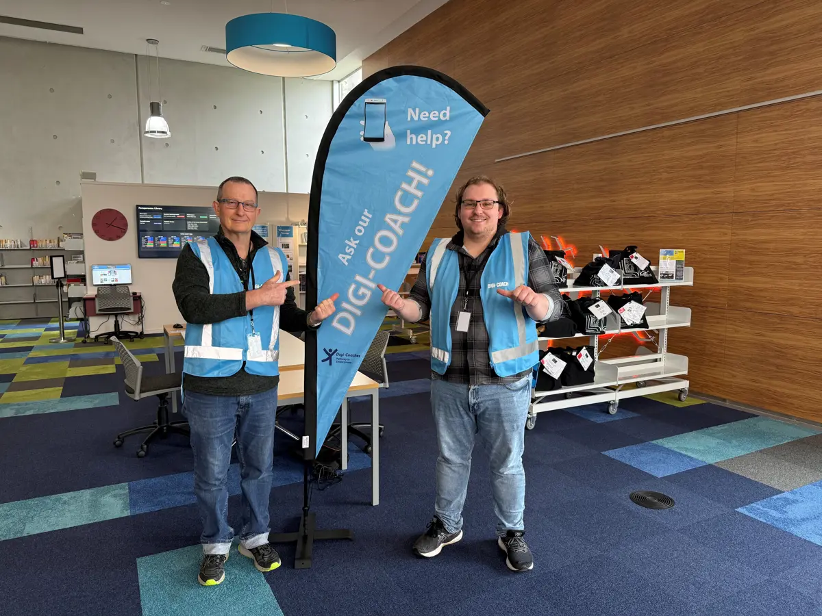 Our two new Digi Coaches Tim and Alex give a thumbs up at Parparaumu Library
