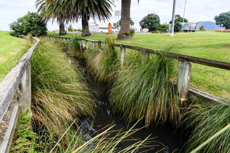 clean 8 kilometres of open drains