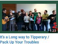 Council staff sing World War One Songs Its's a Long Way to Tipperary and Pack Up Your Troubles with Guitar and Mandolin