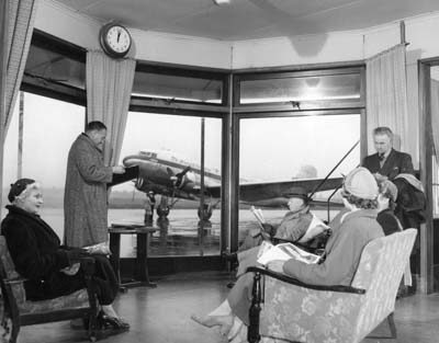 HP 402 - Passengers in waiting room at Paraparaumu Airport 1951