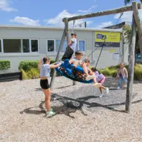 Main Street Playground shared swing thumbnail