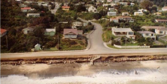 B. Structure failure and coastal erosion following September 1976 storm.