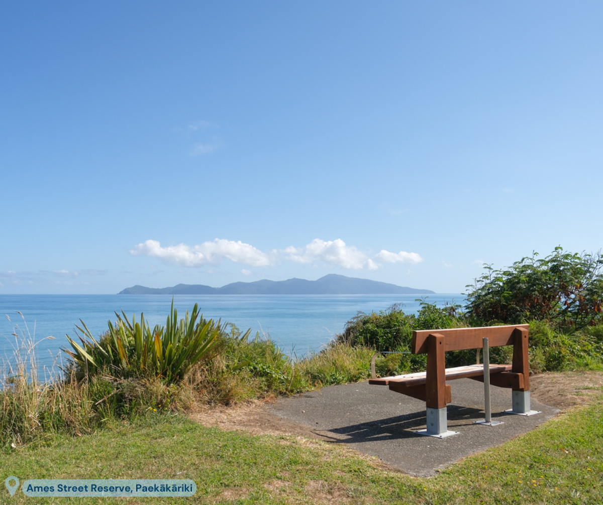 A park bench overlooks the stunning vista out across to Kāpiti Island