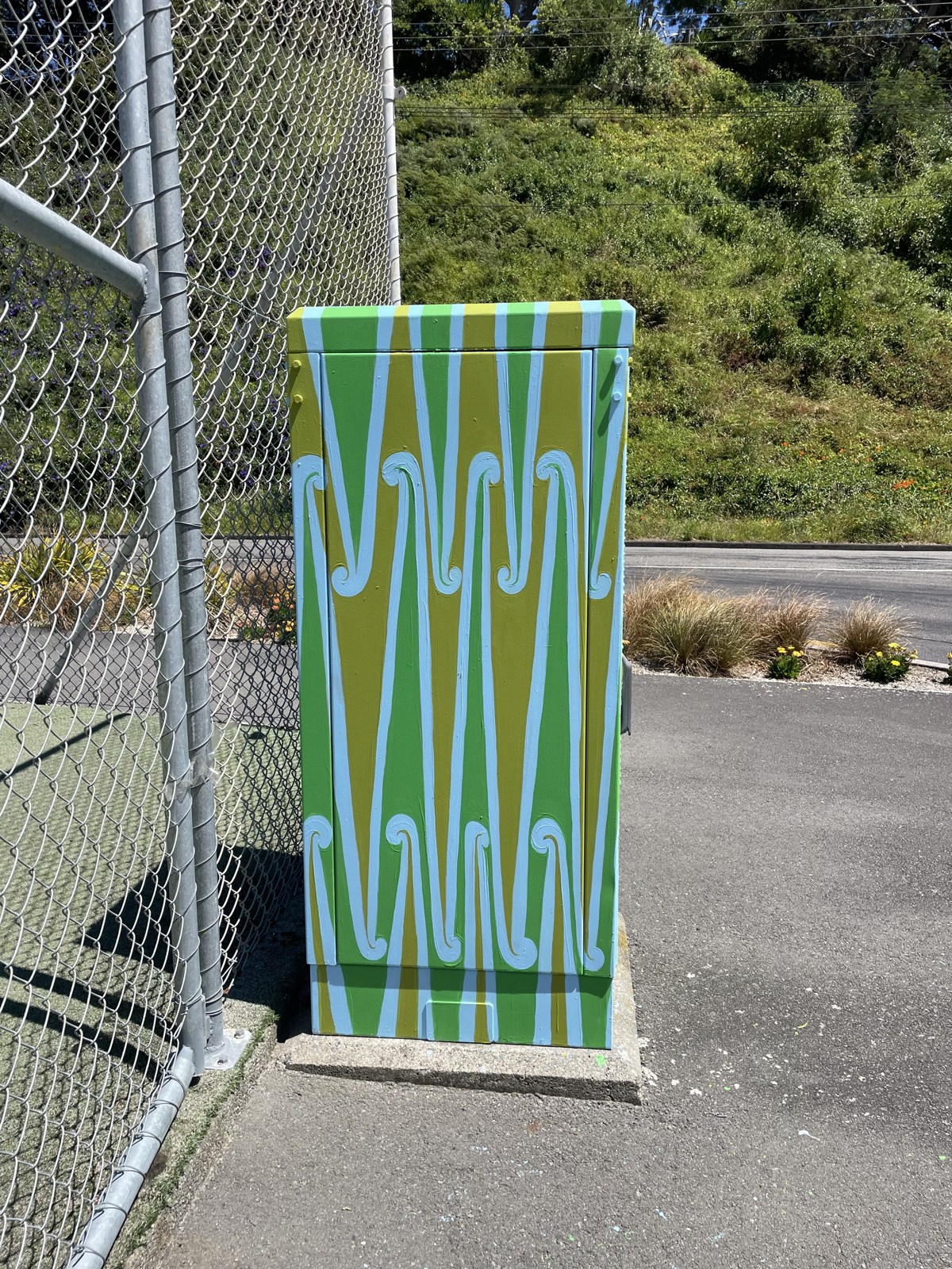 Side view of art cabinet 'Pūhoro', painted by Miriama Grace-Smith